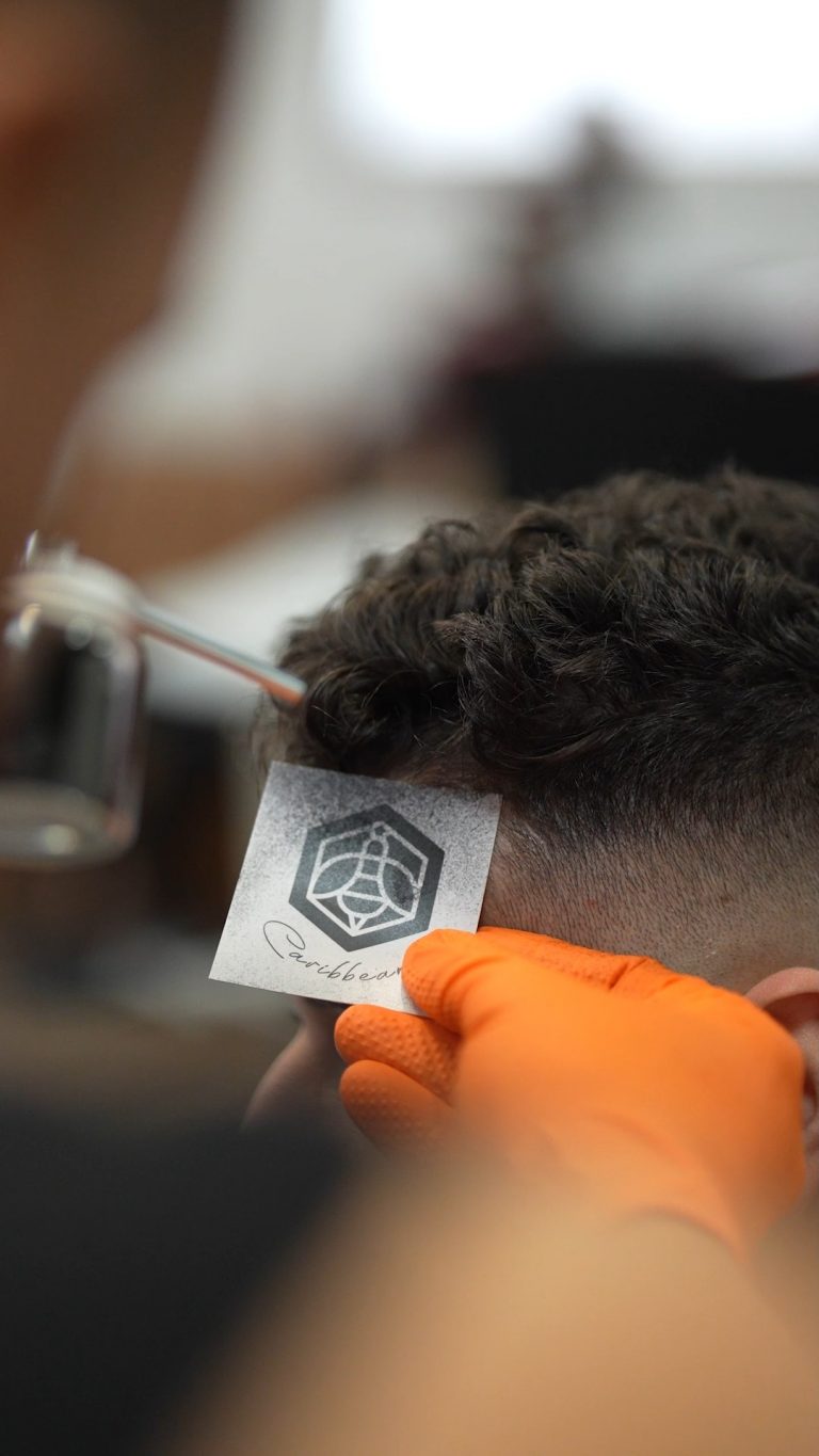 Instagram post from caribbeansbarbershop. This post is in position 5.